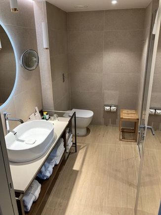 Bathroom. Oddly, everything is designed for very short people. If you're a child or 5ft tall, it's perfect, though. Oh, there's Aqua di Parma toiletries, though.