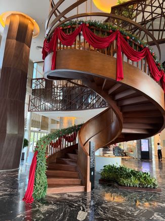 Lobby stairs towards lounge, spa and gym