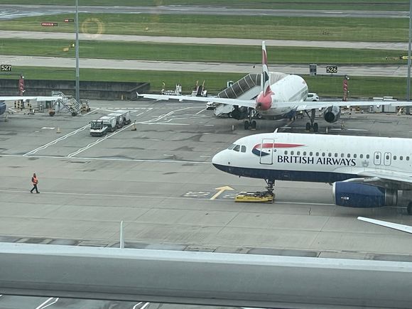 Just curious how long the robotic tugs have been in play at T5? Only one person guiding a plane out of gate now - didn’t there used to be 3?