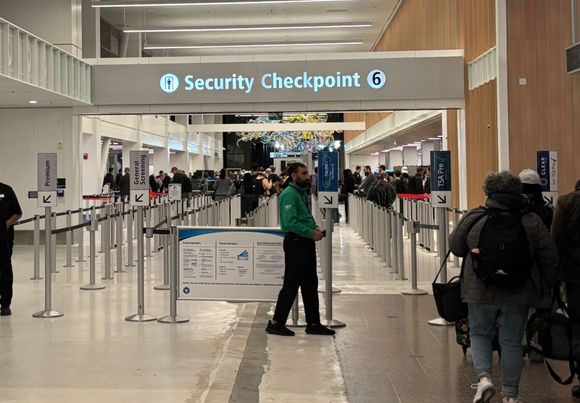 As you enter the checkpoint. Non-Pre/Clear is straight ahead. Premium lane to the far left.