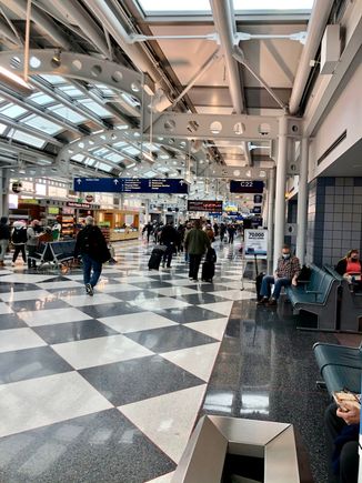 

We arrived at ORD 17 minutes early and was to the gate in concourse C just a few minutes later.  While taxing I noticed my phone was blowing up so I decided to head to the United Club to see what all the fuss was about. 