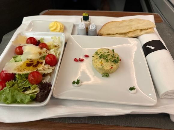 Menu said some Artichoke disk, this looks like a small slob of couscous
