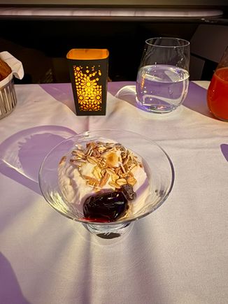 Breakfast - greek yoghurt with pineapple compote and toasted granola. The usual faff with food rationing onboard “sorry you can only have yoghurt or fruit plate not both” was too tired to argue so whatever.