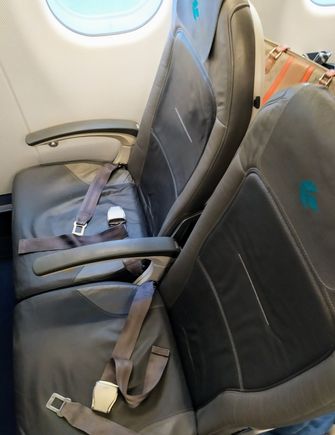 The Air Dolomiti logo is sewn onto the headrests 