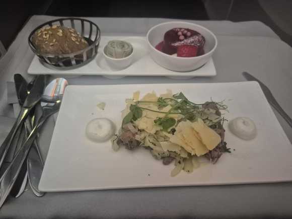 I passed on the second meal service but my wife had the peppered beef carpaccio, and enjoyed it. 