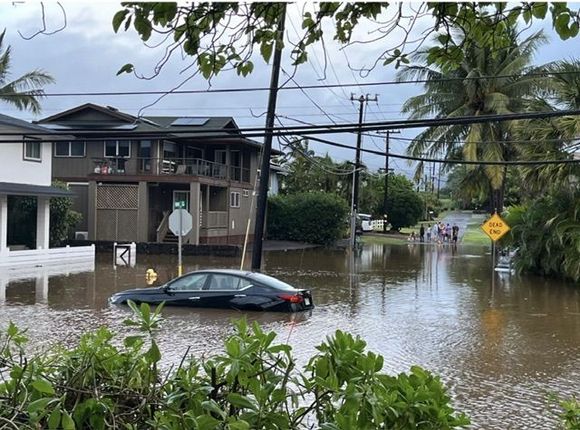 This is Poipu last evening after 11 inches of rain. This is Ho’one Road across the street from and just to the east of Brennecke Beach. 