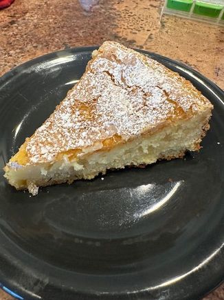 A slice of gooey lemon butter cake for dessert