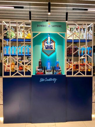 Bar from behind was an ad for Bombay. You can see some of what's on offer on the shelves.