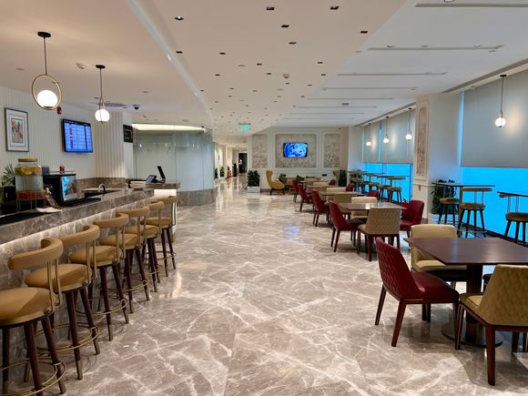 Secondary seating area, with another alcoholic bar and barista coffee