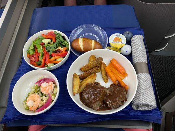 The shrimp salad with white rice and pea salad (very nice) and the beef which was soft and delicious.

 Not pictured is the sundae which was just ok. 
