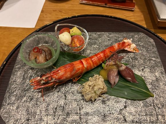 Appetizers inc whole squid, sea cucumber and fish roe 