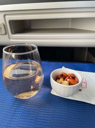 Whispering Angel Rose.  It wasn't on top of the cart and the F/A said she didn't think she had any, but she looked in one of the drawers and lo and behold.