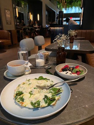 Eggwhite feta and spinach omelette. Meh. Delicious granola and Greek yogurt with berries on the side.