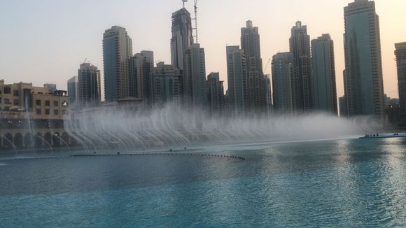 The Dubai Fountain is the world's largest choreographed fountain system. It is set on the 30-acre manmade Burj Khalifa Lake, at the center of the Downtown Dubai development in Dubai, United Arab Emirates. Wikipedia

Start by 6pm everyday and lasted for 5 mins or so.