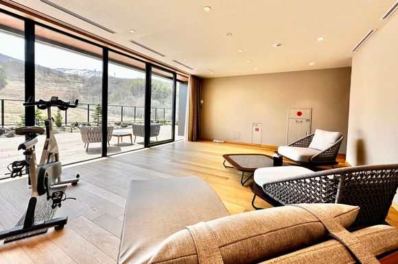Installed daybeds and exercise bike in the penthouse room