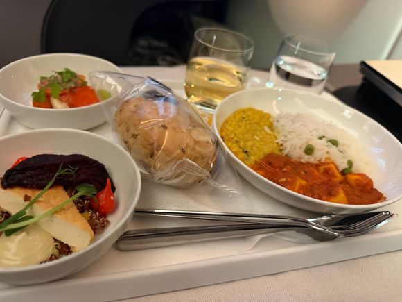 This was the VLML special meal from HEL-ICN.

- Cheese salad with grape puree and carrots
- Smoked Finnish cottage cheese with quinoa and avocado and beets
-  Lentil Dahl and paneer.

It was all delicious.