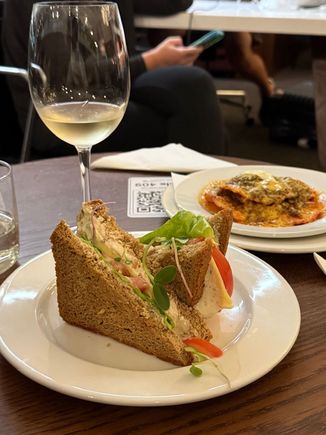 BA lounge at CPT. Exceeded my expectation. Sandwich, nachos and nice wine delivered to table.