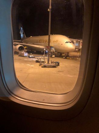 Upon taxiing to our gate, we pulled up next to an Etihad A380.