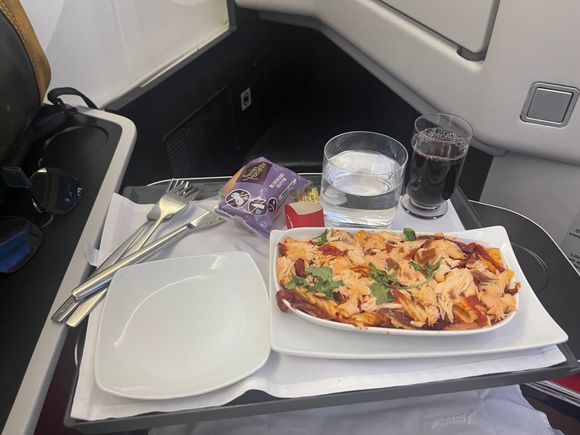 Single course. Blueberry muffin for dessert. I’ve had nicer meals on 1 hour flights in Europe. 