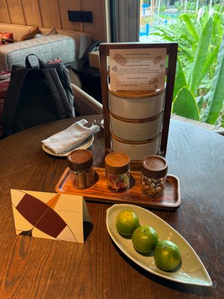 welcome amenities: Thai snacks + macarons and fruits, no more coconuts
