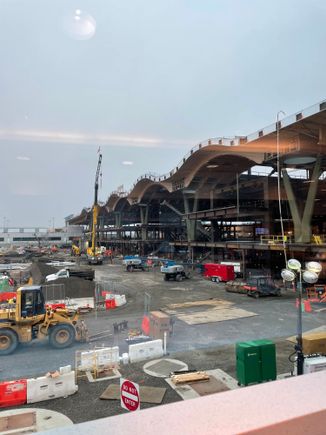 New roof going up at PDX; view from Alaska lounge at PDX