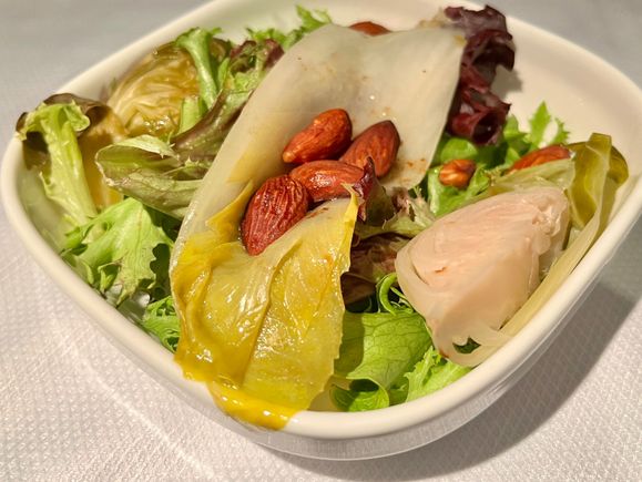 Kale, endive, pickled brussels sprouts, and smoked almonds 