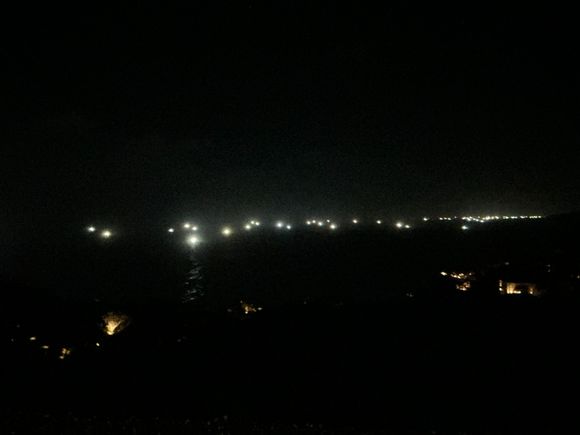 Nightly fishing boats lighting up the horizon and while we study the constellations / stars on clear nights 
