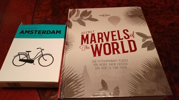 The Amsterdam Crumpled Map is printed on a very flexible material, with a nice map of Amsterdam. The Lonely Planet "Secret Marvels of the World" will help us find new places to visit!