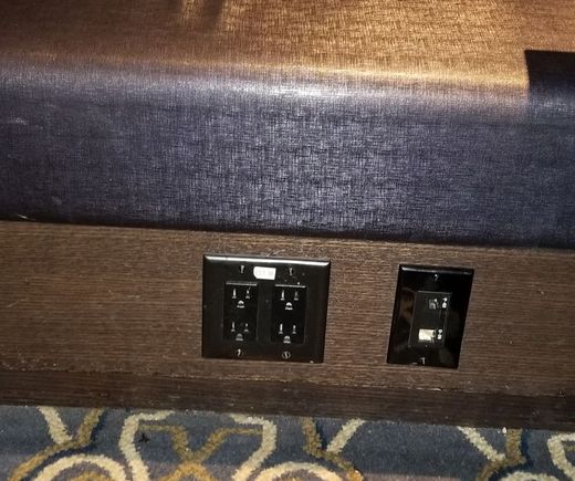 Example of electrical outlets for device charging in lounge seats