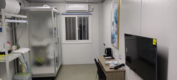 Prefab quarantine facility - room towards window