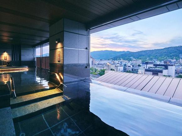 View from one of the public baths, taken from Booking.com. You could not bring your phone in; one of the baths faced the skyline and other one faced the wall. They alternated each way to ensure each gender can experience the open-air one. (as the baths are gender-separated)
