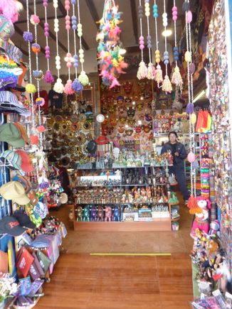 Store selling all sorts of souvenirs. There were a lot of stores like this all over the place