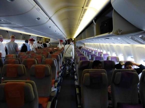 Emirates 777 Y cabin on boarding.