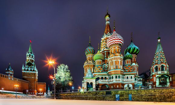 St Basil's Cathedral and Spasskaya Bashnya tower of the Kremlin in Moscow.  5D4+17mm TSE lens, f/10, 3 exposure in camera HDR (1/2 sec, +/-)  on a calm pre sunrise morning after a light dusting of snow.