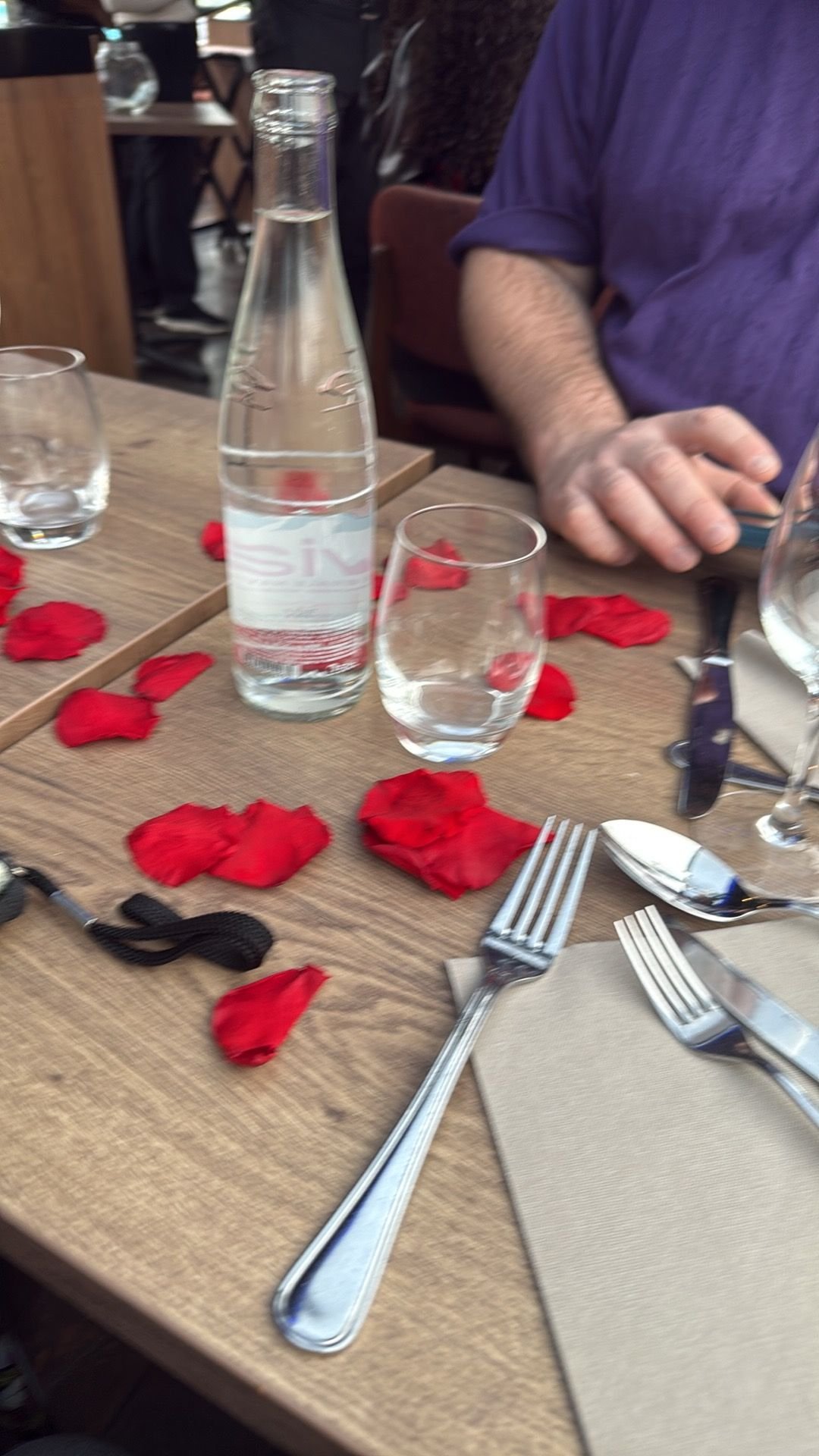 Table set up with rose petals