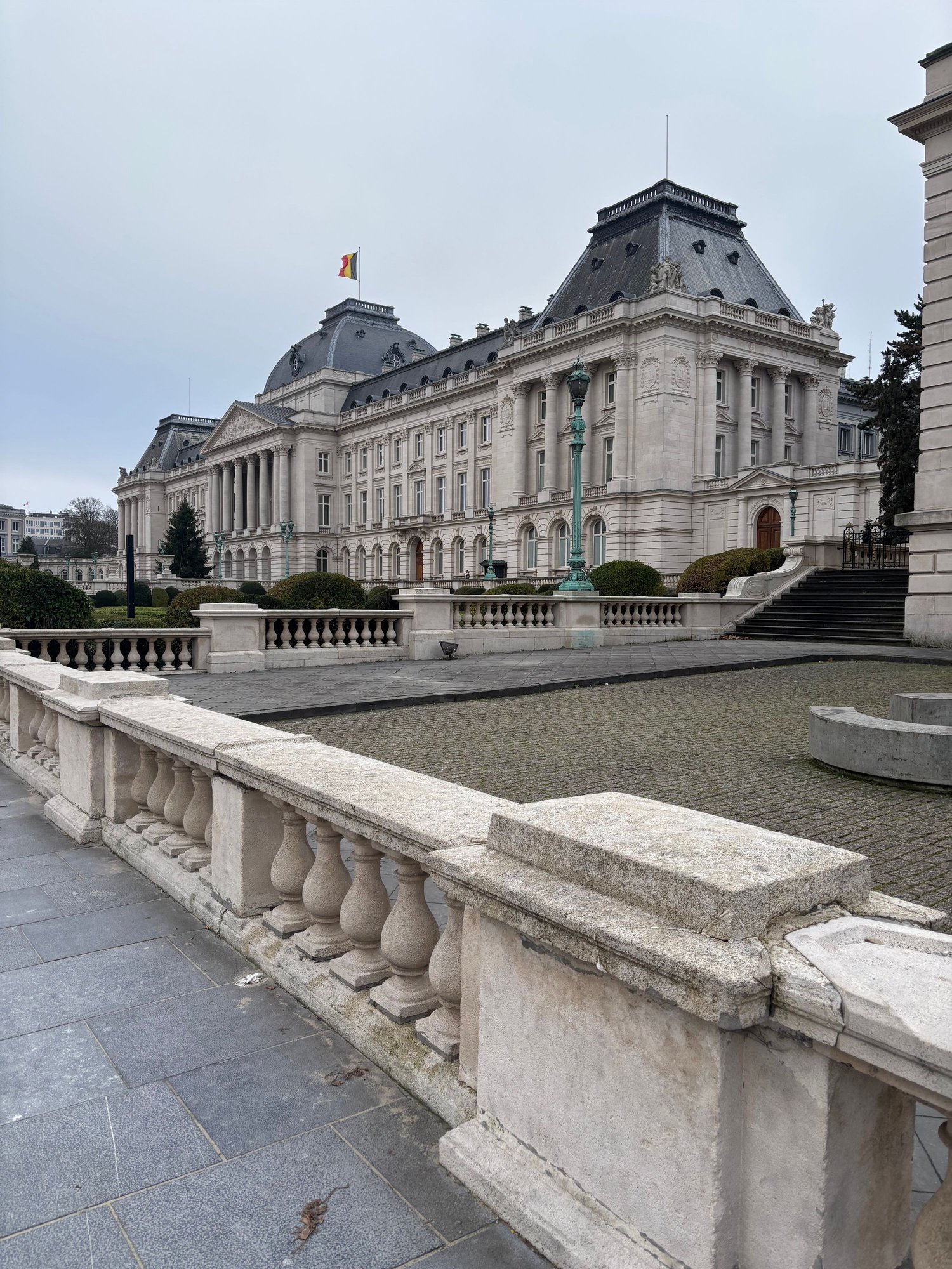 The Royal Palace.  You might just be able to see three guards.  Nowadays this is used as an office for the King, he doesnt live there.