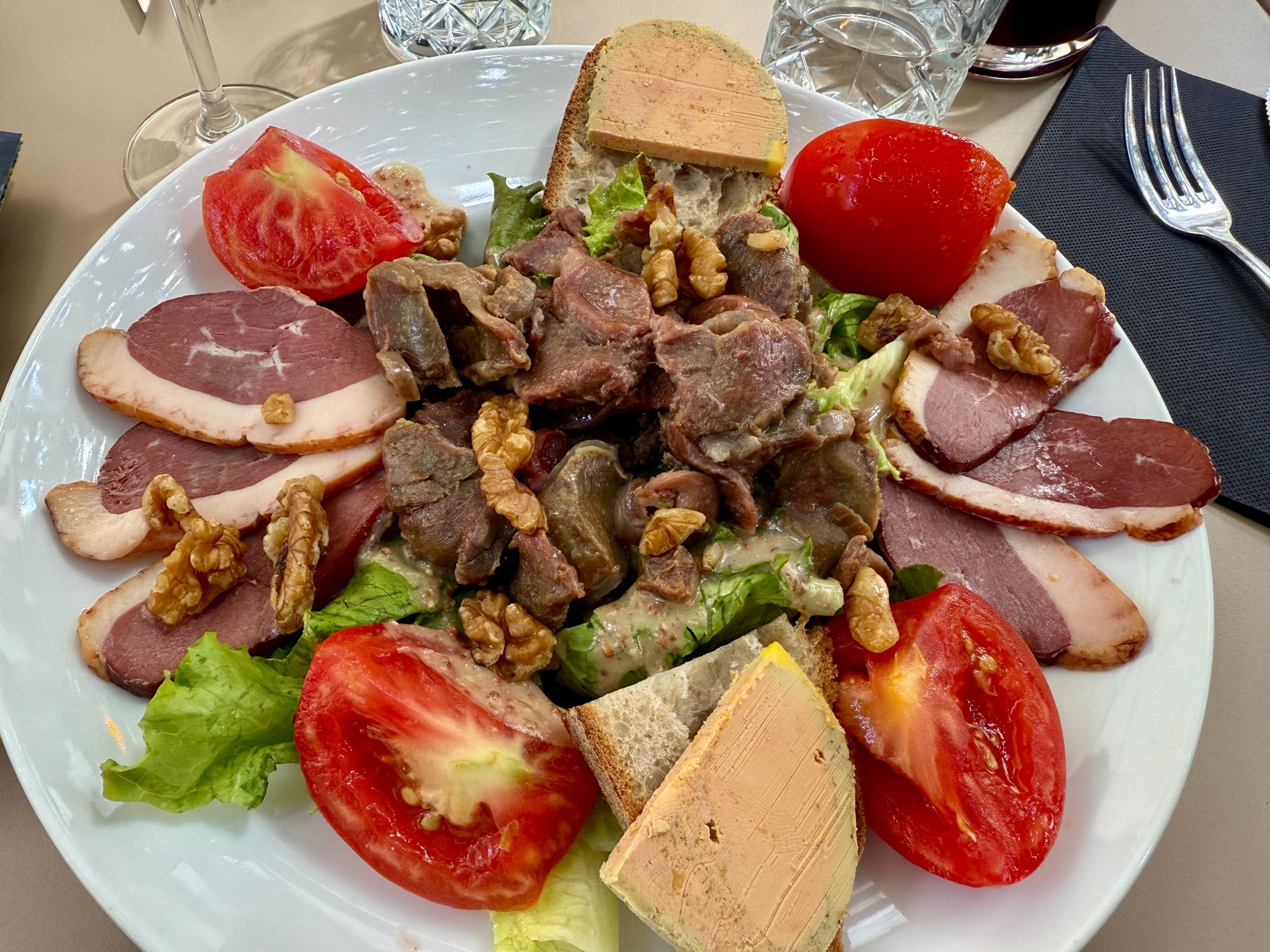 French salads are mostly meat.  Smoked duck, foie gras, g�siers