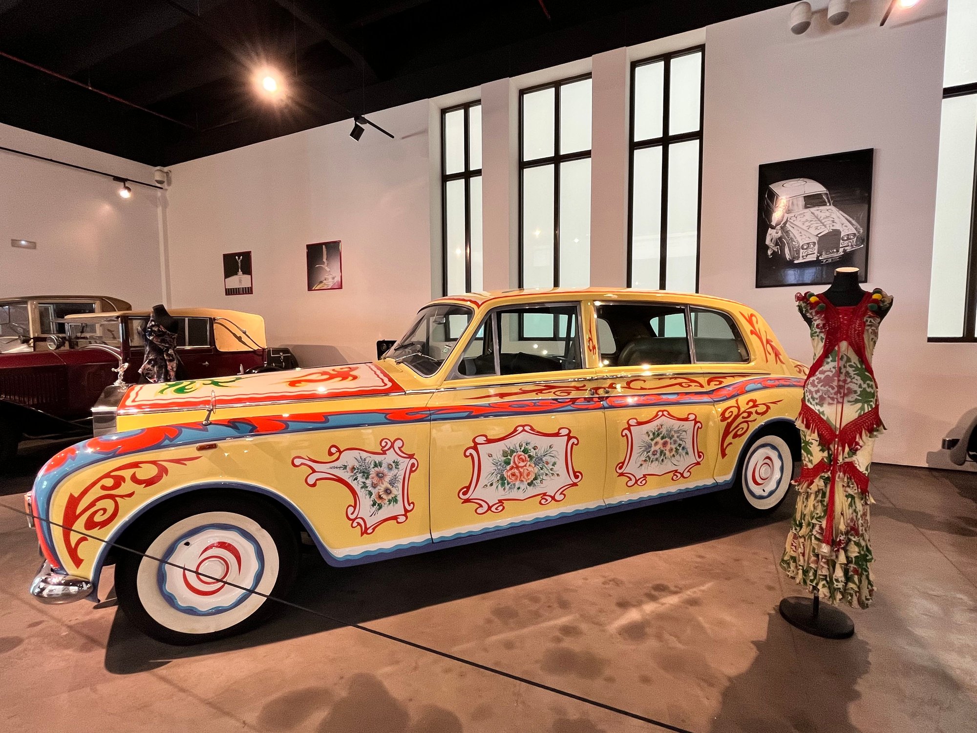 Love the juxtaposition of classic cars and fashion