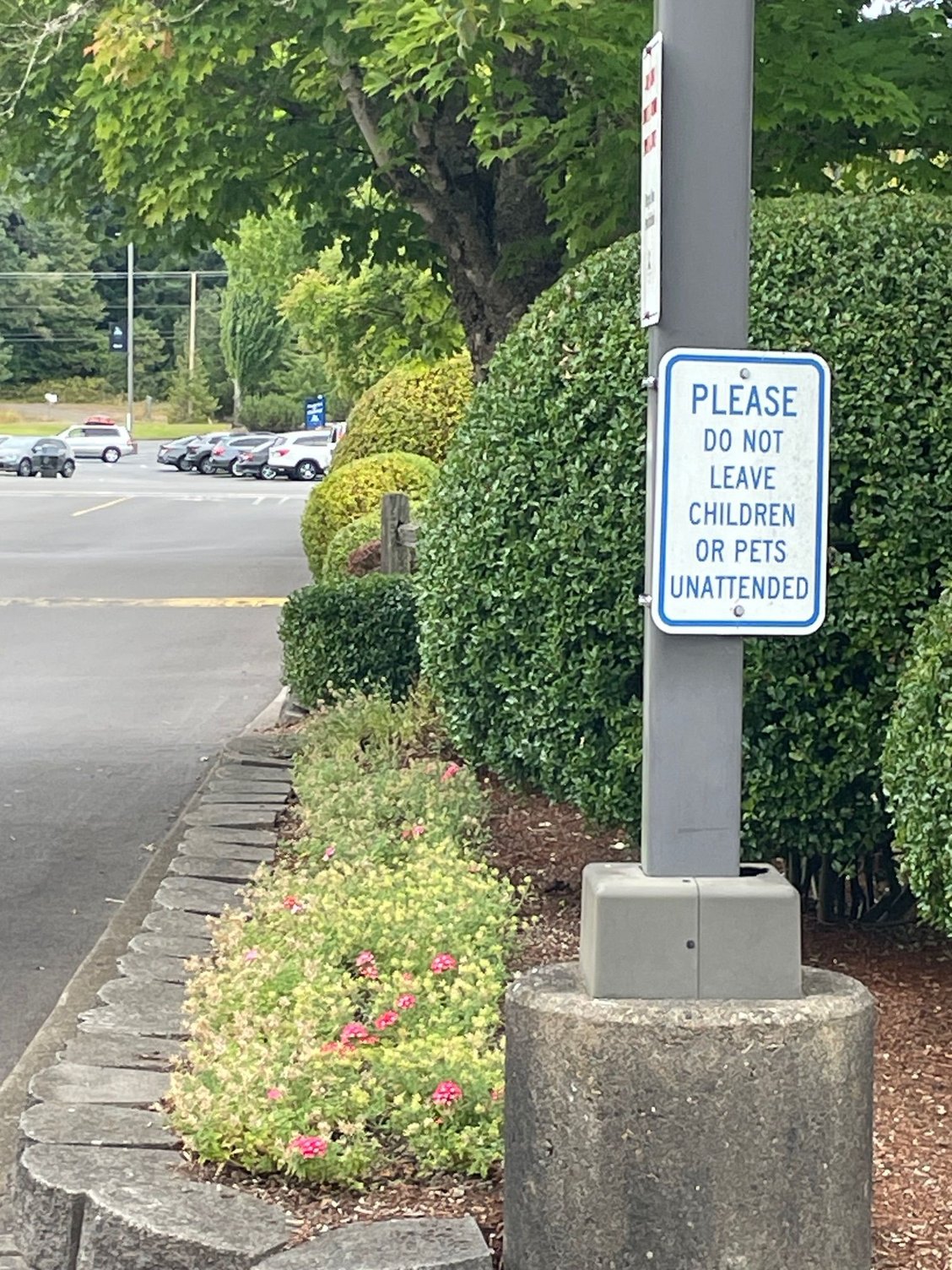 Saw this sign as we were driving out.  I can see leaving Grandma or a couple of kids in the car, but what monster would leave Fluffy the beloved family pet.