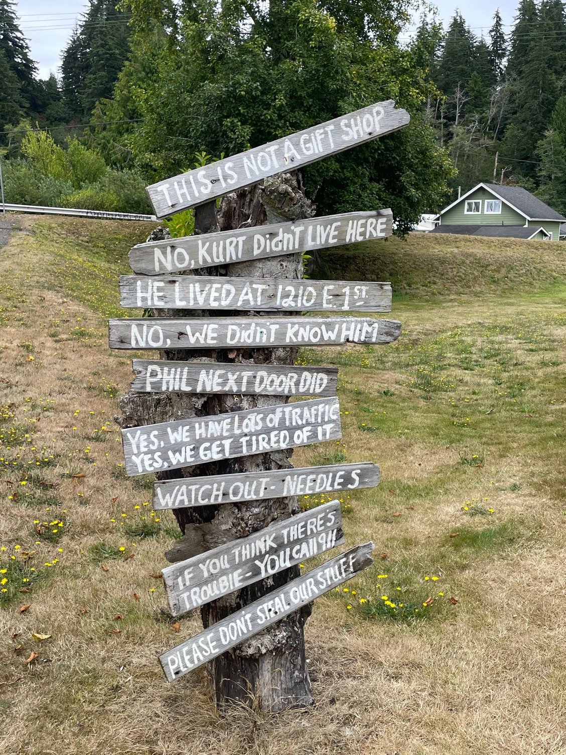 Funny sign posted on the property of the neighbor who lives right next to the bridge.