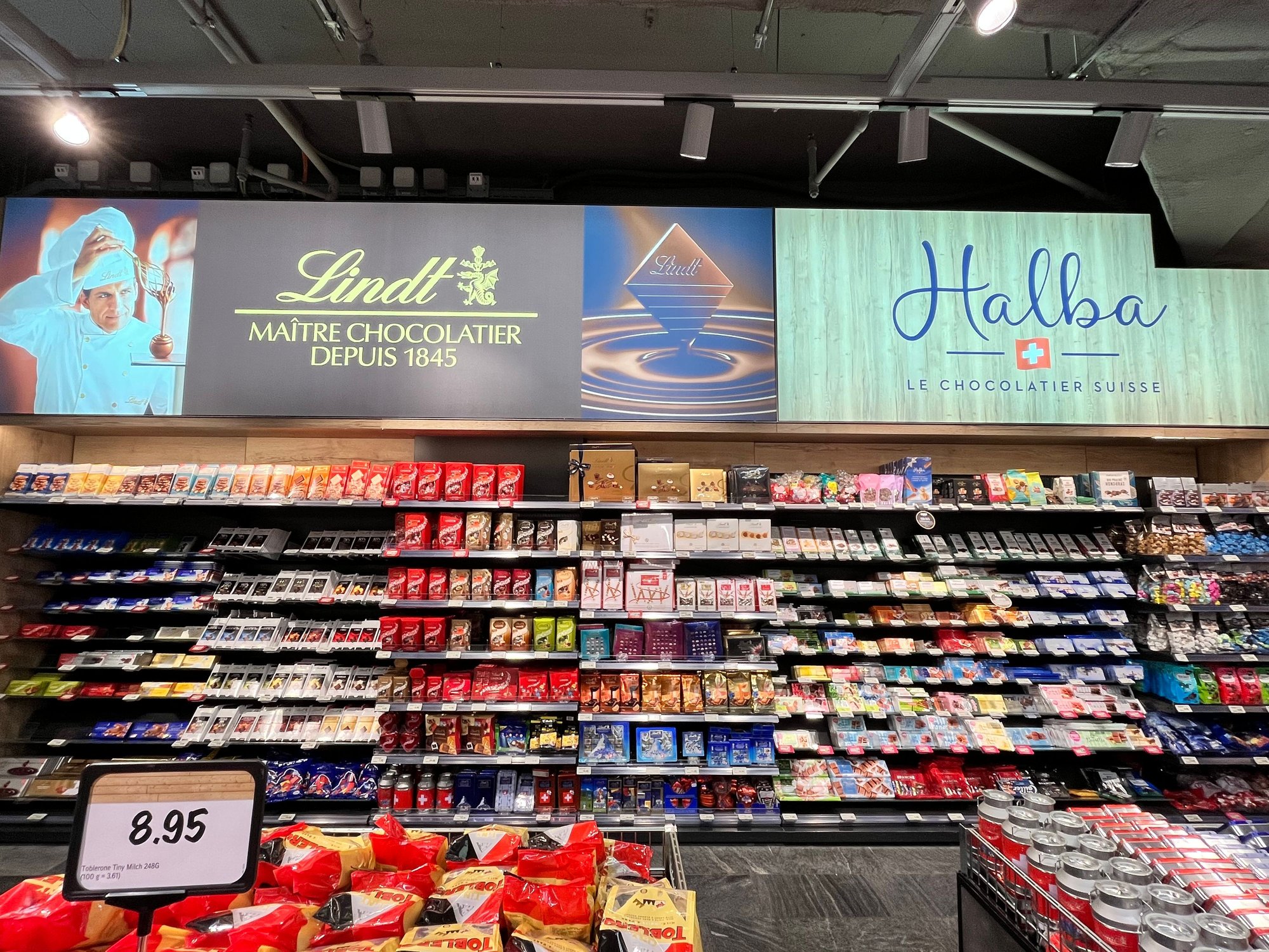 Wall of chocolates at Coop City basement supermarket