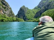 Boat ride through deep canyon 