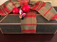 Shagreen boxes in foyer are wrapped like presents