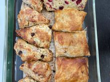 Christmas breakfast bread assortment (cranberry-banana bread, pumpkin bread, apple turnover, pear-chocolate chip scones, apple-cinnamon scones)