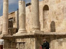 Roman theater - musician playing olive can instrument!