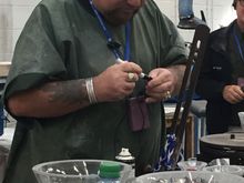 This is Sean, owner of Dingle Crystal and the head glass cutter. He parks his Harley inside the building. a very large Harley. I imagine he is the nephew that guy was talking about. We toured the factory, hence my purchases.