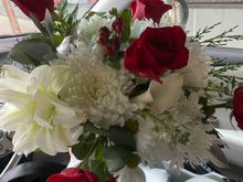 I had her trim the roses down. I tried to pass off my milk chocolate Godiva for her but it turns out this mother likes dark chocolate. Which is in her favor by my standards, lol. 