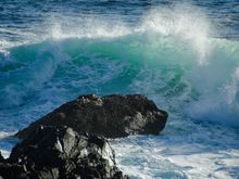 Wave action pummels the island's coast.