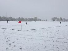 Shoveling the soccer lines before just calling the game.