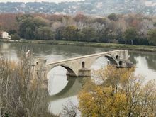 The bridge from the Jardin des Doms above it